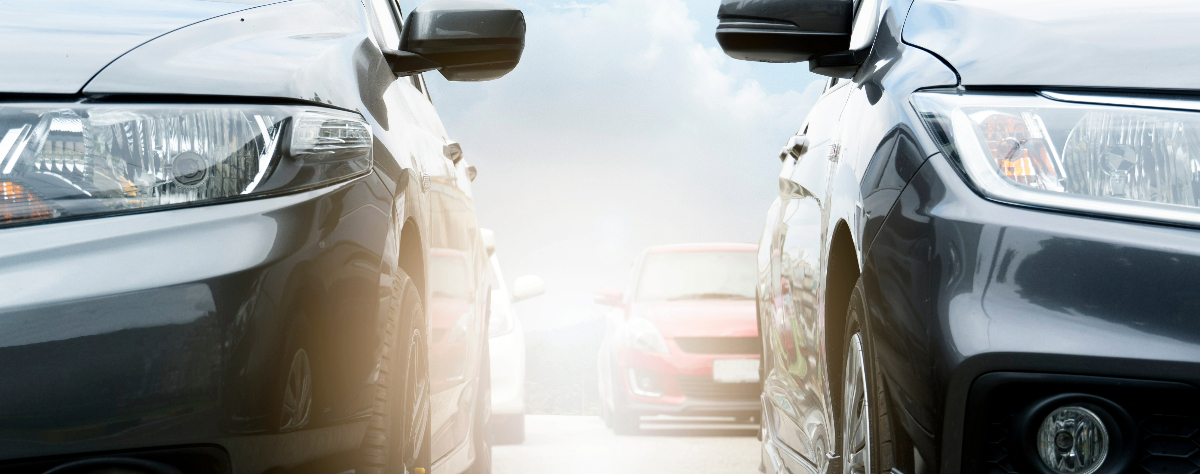 Two Shining cars parked after accident repair